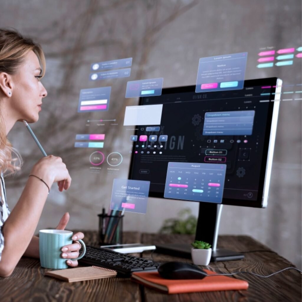 Digital Marketer analyzing website layout architecture on a desktop computer.